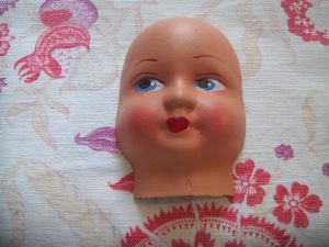 DEMI TETE DE POUPEE ANCIENNE