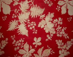  Tissu ancien 1900 sur fond rouge