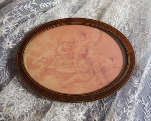 Charmant petit cadre ovale ancien en marqueterie
