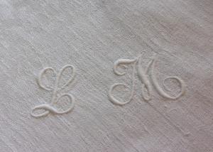 Monogramme ancien LM sur serviette