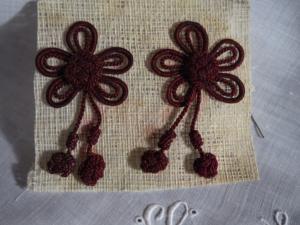 2 motifs anciens en passementerie bordeaux