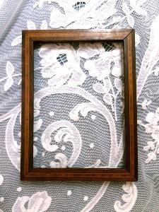 Petit cadre ancien en bois avec un filet de marqueterie